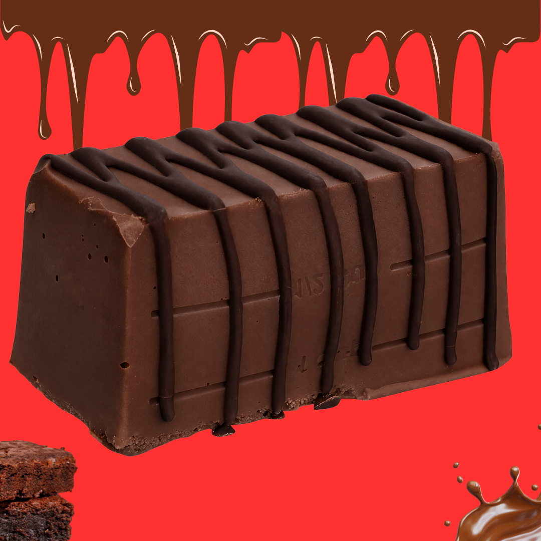 A Chocolate Brownie Fudge bar with dark chocolate drizzle sits on a vibrant red background, surrounded by chocolate splashes and a piece of handmade fudge—ideal for UK delivery.