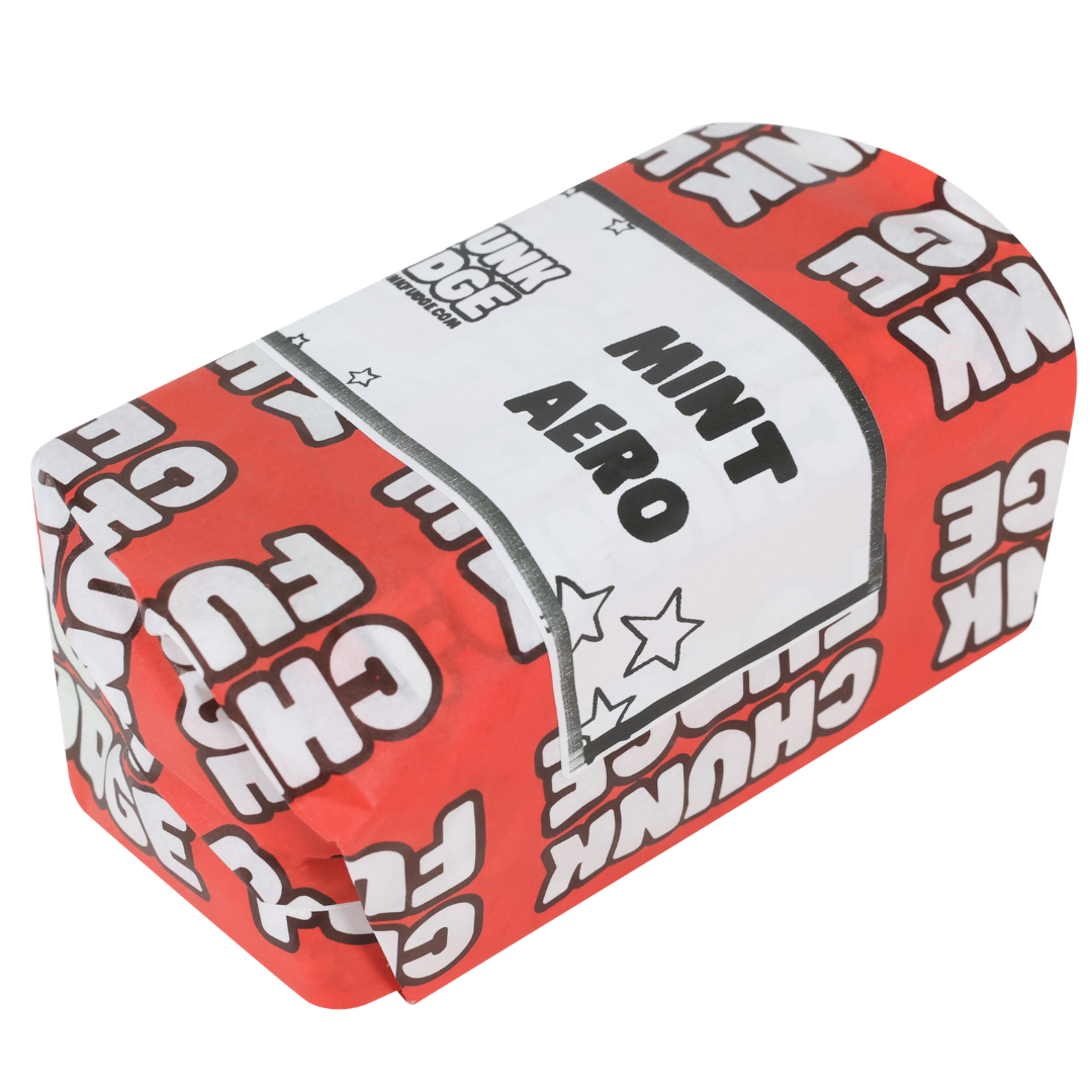 The Mint Aero Fudge comes in red and white packaging with bold "CHUNK FUDGE" text and a label reading "MINT AERO" in black letters with star accents—ideal for fans of mint aero fudge.